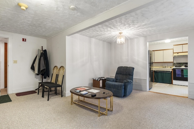 103 S St, Bath, ME 04530 - interior space featuring a textured ceiling, baseboards, and light carpet