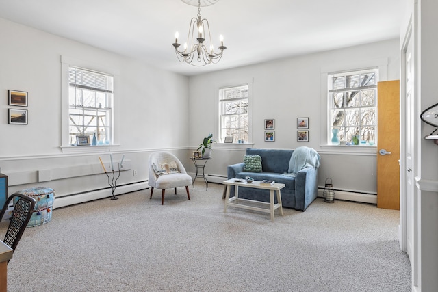 103 S St, Bath, ME 04530 - living area featuring a chandelier, carpet flooring, and a baseboard radiator