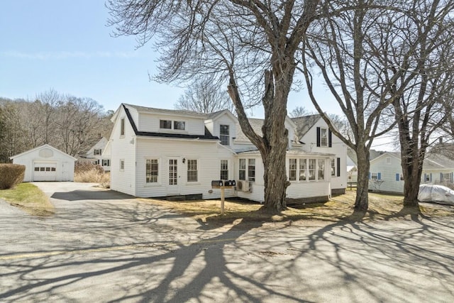 9 School St, Boothbay Harbor, ME 04538 - exterior space featuring an outbuilding, a garage, and aphalt driveway