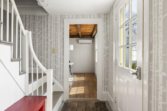 9 School St, Boothbay Harbor, ME 04538 - bathroom featuring wallpapered walls, a wall mounted air conditioner, baseboards, and hardwood / wood-style flooring