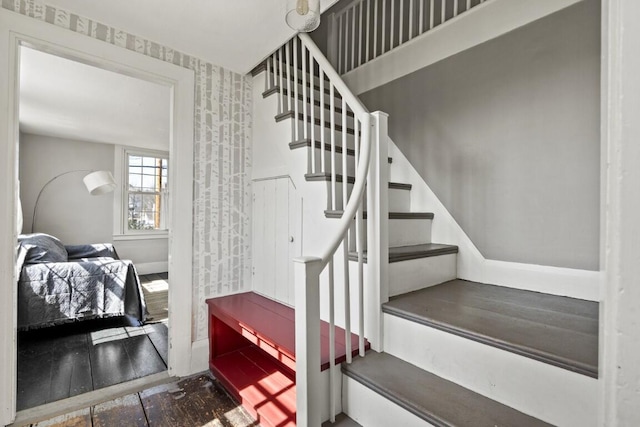 9 School St, Boothbay Harbor, ME 04538 - stairway featuring baseboards and wallpapered walls