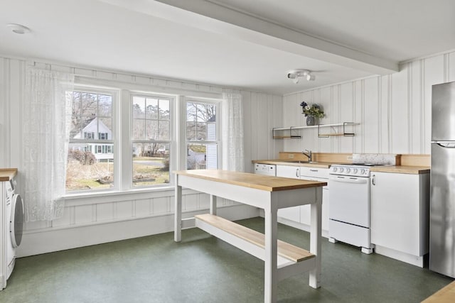 9 School St, Boothbay Harbor, ME 04538 - kitchen with open shelves, a sink, white appliances, white cabinetry, and butcher block countertops