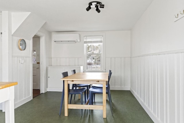 9 School St, Boothbay Harbor, ME 04538 - dining room with wainscoting and a wall unit AC
