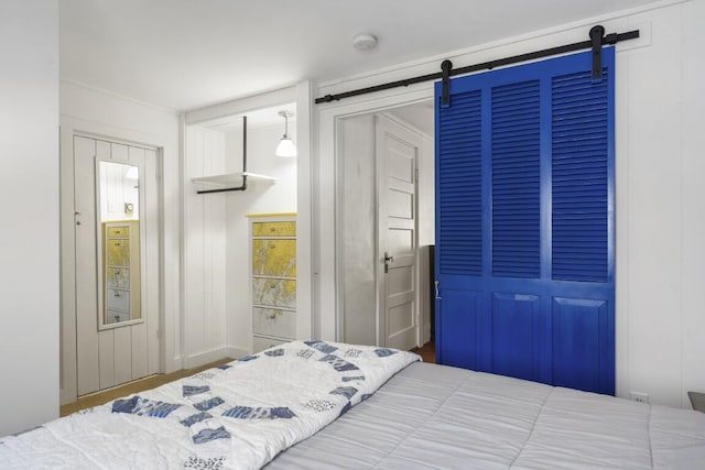 9 School St, Boothbay Harbor, ME 04538 - bedroom featuring a barn door