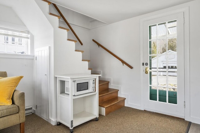 9 School St, Boothbay Harbor, ME 04538 - staircase featuring a baseboard radiator and carpet floors
