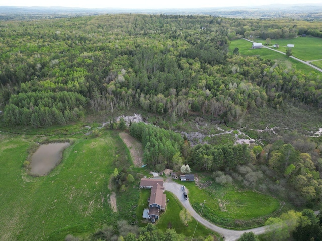 15 Murphy Ln, Madison, ME 04950 - aerial view of property and surrounding area featuring a heavily wooded area