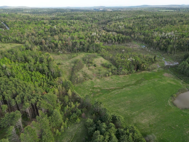 15 Murphy Ln, Madison, ME 04950 - aerial view of property and surrounding area featuring a heavily wooded area