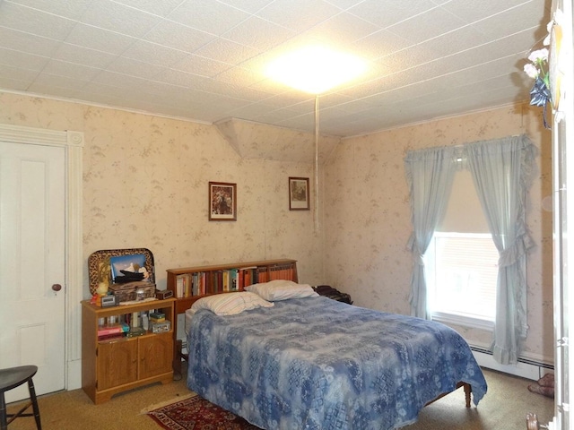 16 Pleasant St, Milo, ME 04463 - bedroom with baseboard heating, wallpapered walls, and carpet floors