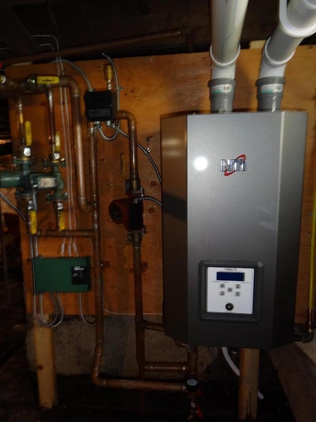16 Pleasant St, Milo, ME 04463 - utilities with water heater