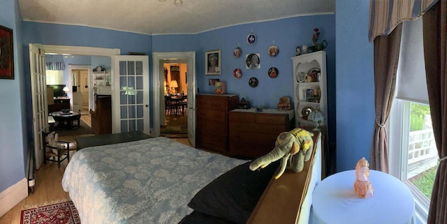 16 Pleasant St, Milo, ME 04463 - bedroom featuring wood finished floors