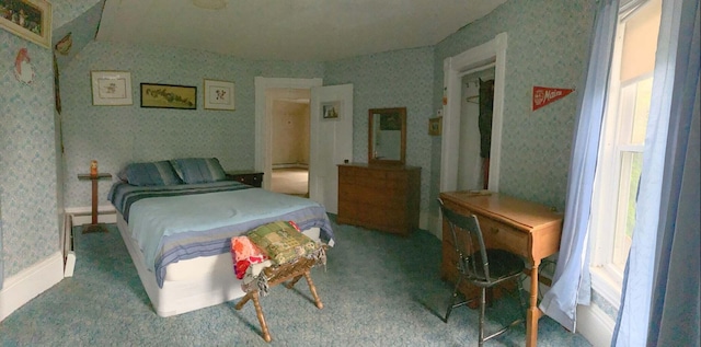 16 Pleasant St, Milo, ME 04463 - bedroom featuring multiple windows, carpet, and wallpapered walls