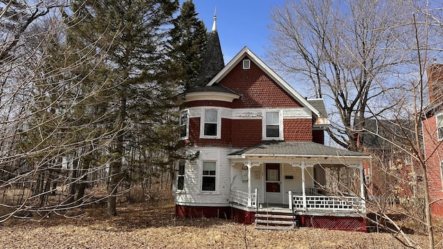 16 Pleasant St, Milo, ME 04463 - victorian house featuring covered porch