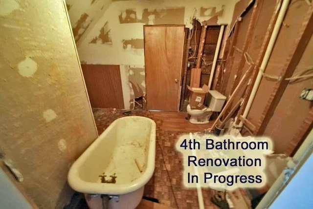 84 Military St, Houlton, ME 04730 - full bath featuring a soaking tub and vaulted ceiling