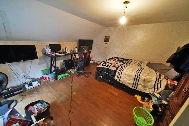 84 Military St, Houlton, ME 04730 - bedroom with wood finished floors and vaulted ceiling