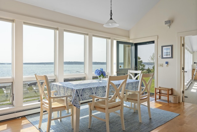 223 Pemaquid Trl, Bristol, ME 04554 - sunroom featuring a water view, wood finished floors, and high vaulted ceiling