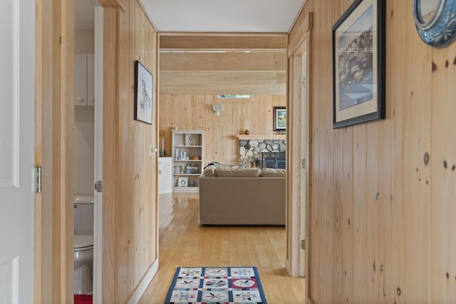 223 Pemaquid Trl, Bristol, ME 04554 - corridor with wooden walls and light wood finished floors