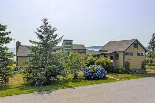 223 Pemaquid Trl, Bristol, ME 04554 - view of front of home featuring a chimney and roof with shingles
