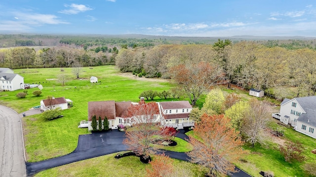 drone / aerial view with a view of trees
