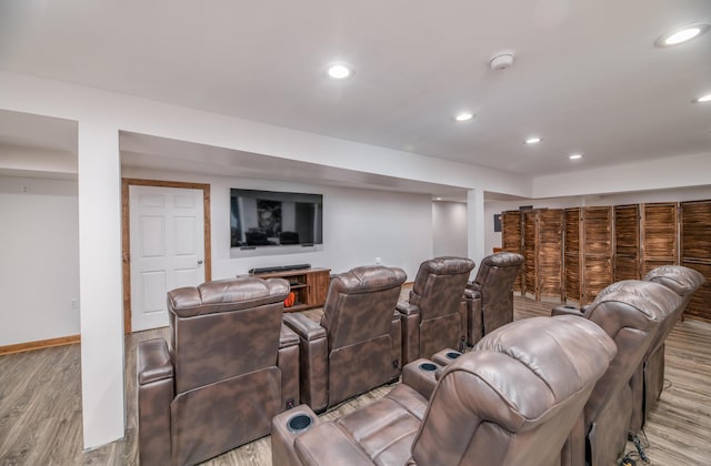 575 Hallowell Rd, Chelsea, ME 04330 - cinema room with wood finished floors, recessed lighting, and baseboards