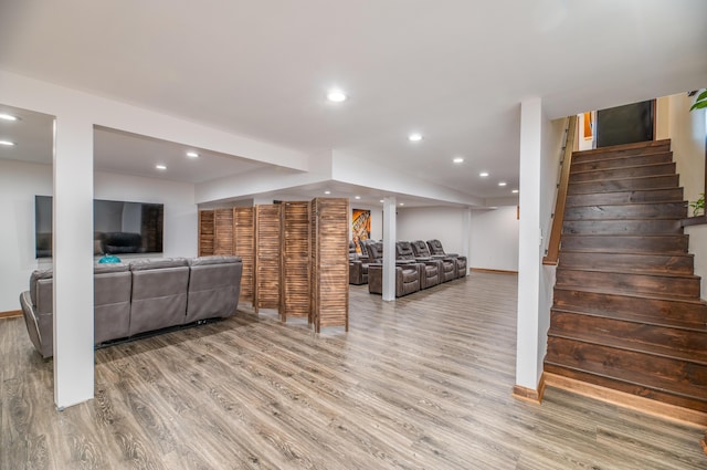575 Hallowell Rd, Chelsea, ME 04330 - living room featuring light wood-type flooring, stairs, baseboards, and recessed lighting