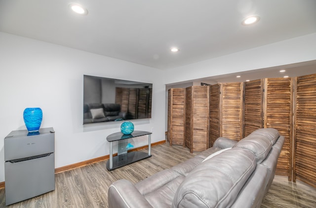 575 Hallowell Rd, Chelsea, ME 04330 - living area featuring baseboards, wood finished floors, and recessed lighting