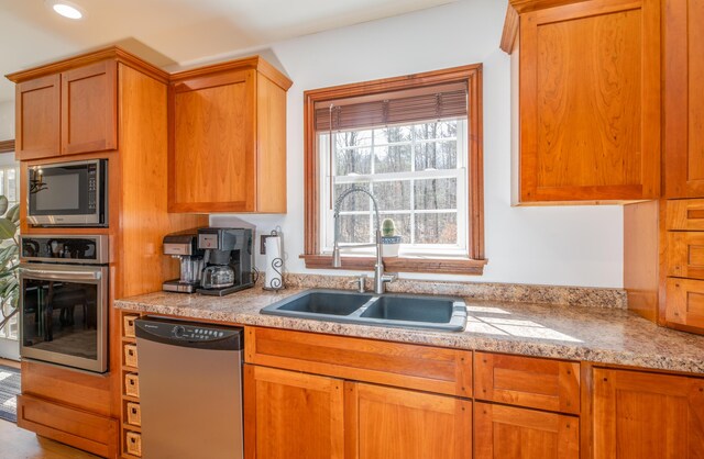 575 Hallowell Rd, Chelsea, ME 04330 - kitchen with stainless steel appliances, a sink, light countertops, and recessed lighting