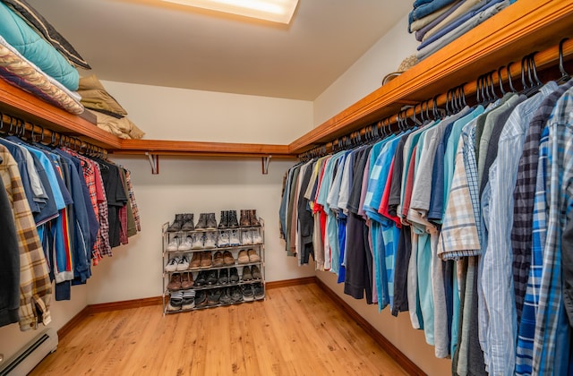 575 Hallowell Rd, Chelsea, ME 04330 - spacious closet featuring baseboard heating and wood finished floors