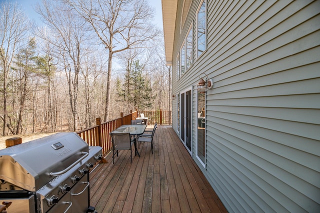 575 Hallowell Rd, Chelsea, ME 04330 - wooden terrace with outdoor dining space and a grill