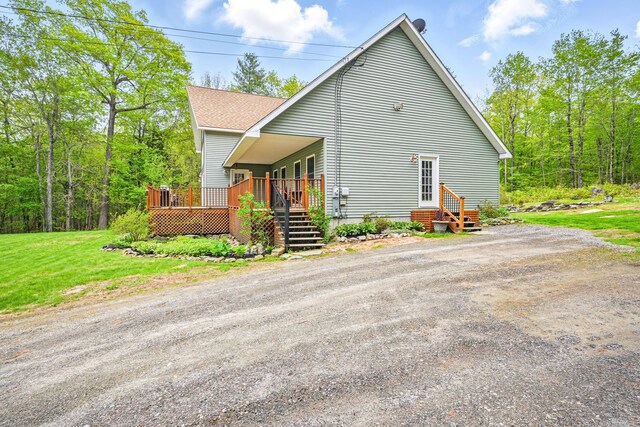 575 Hallowell Rd, Chelsea, ME 04330 - rear view of property with a wooden deck and roof with shingles