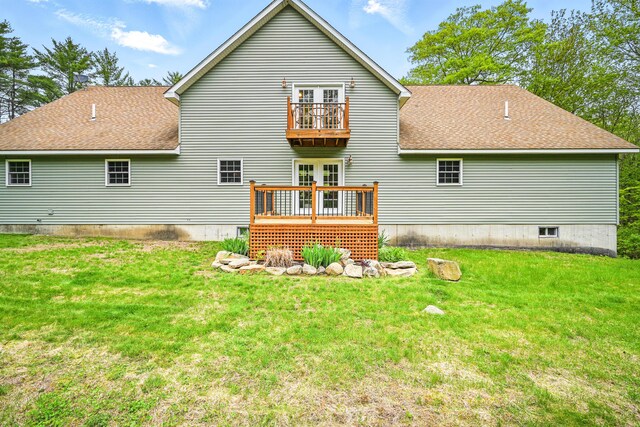 575 Hallowell Rd, Chelsea, ME 04330 - rear view of house with french doors, a shingled roof, a wooden deck, and a yard
