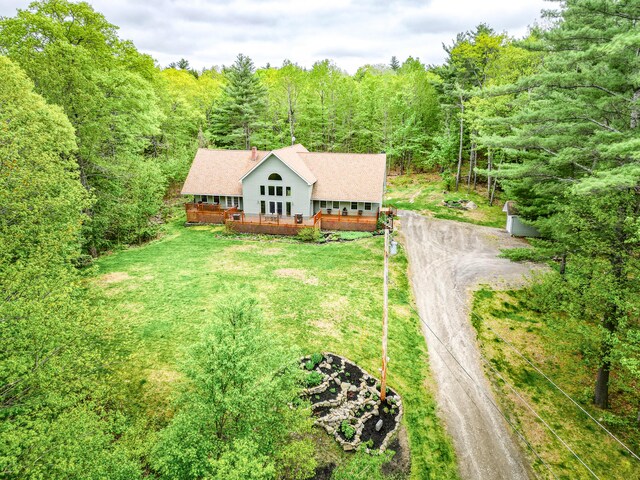 575 Hallowell Rd, Chelsea, ME 04330 - aerial view of property and surrounding area featuring a heavily wooded area
