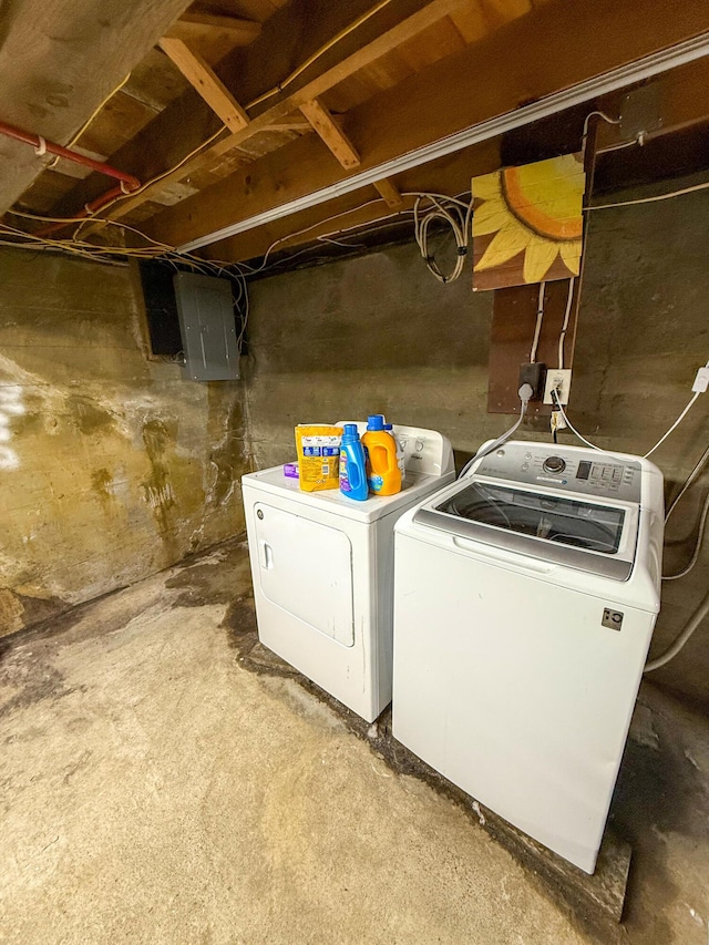 laundry room with washer and dryer and laundry area