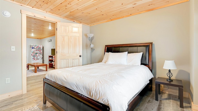 18 Lovers Ln, Bethel, ME 04217 - bedroom featuring baseboards, wooden ceiling, and wood finished floors