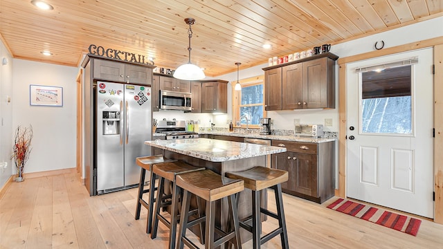 18 Lovers Ln, Bethel, ME 04217 - kitchen with stainless steel appliances, light stone countertops, light wood finished floors, and wooden ceiling