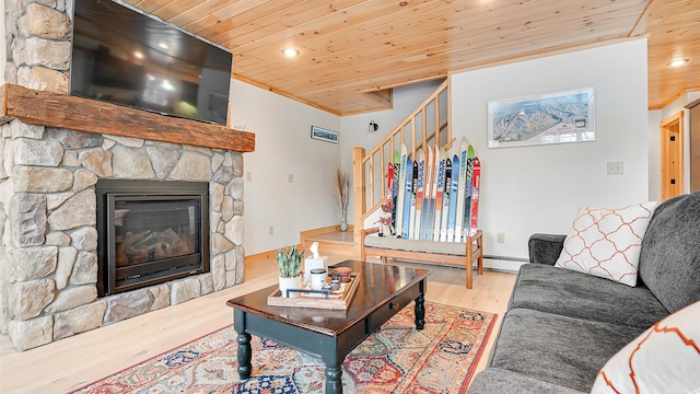 18 Lovers Ln, Bethel, ME 04217 - living area with wood ceiling, wood finished floors, a baseboard heating unit, and stairs