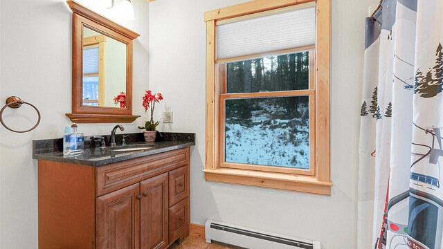 18 Lovers Ln, Bethel, ME 04217 - full bath featuring vanity and baseboard heating