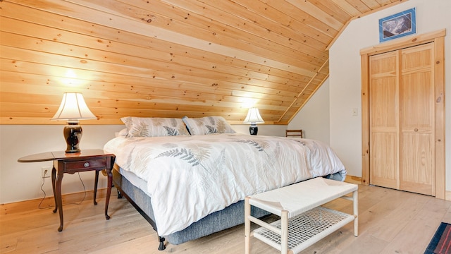 18 Lovers Ln, Bethel, ME 04217 - bedroom featuring a closet, baseboards, lofted ceiling, wooden ceiling, and wood finished floors