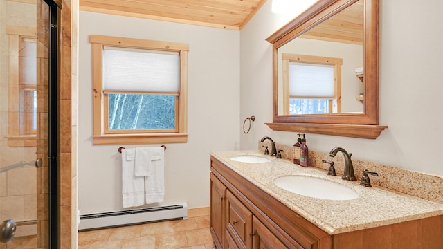 18 Lovers Ln, Bethel, ME 04217 - full bath with tiled shower, a baseboard heating unit, and a sink