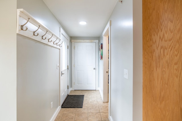 480 E Shore Dr, Acton, ME 04001 - doorway with light tile patterned flooring and baseboards