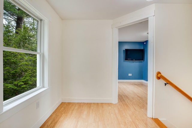 480 E Shore Dr, Acton, ME 04001 - unfurnished room featuring light wood-style flooring, a wealth of natural light, and baseboards