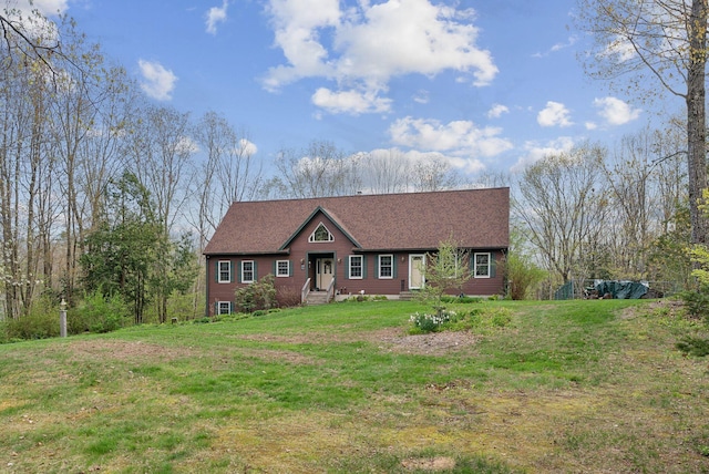 14 Stonebrook Rd, Windham, ME 04062 - view of front facade with a front yard and a shingled roof