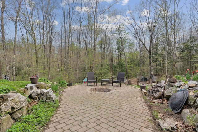 14 Stonebrook Rd, Windham, ME 04062 - view of patio / terrace featuring a forest view