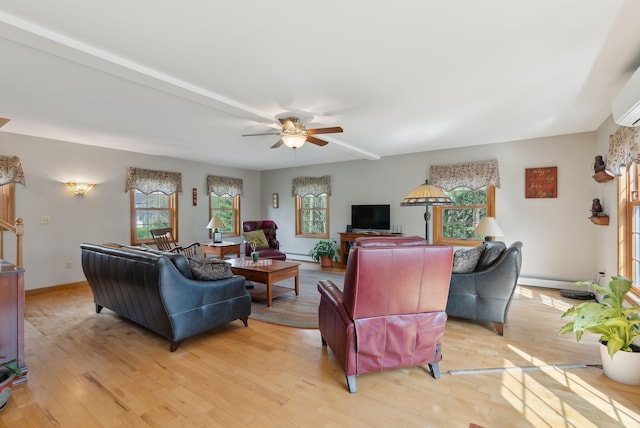 14 Stonebrook Rd, Windham, ME 04062 - living area featuring healthy amount of natural light, light wood finished floors, baseboard heating, and ceiling fan