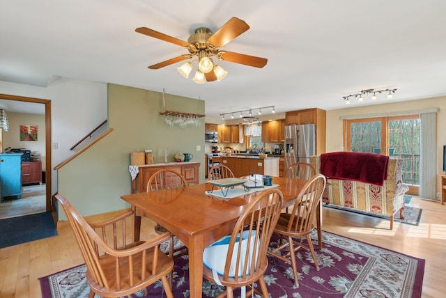 14 Stonebrook Rd, Windham, ME 04062 - dining space with track lighting, light wood-style floors, and ceiling fan