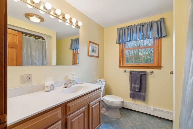 14 Stonebrook Rd, Windham, ME 04062 - full bath featuring a baseboard heating unit, tile patterned flooring, vanity, toilet, and baseboards