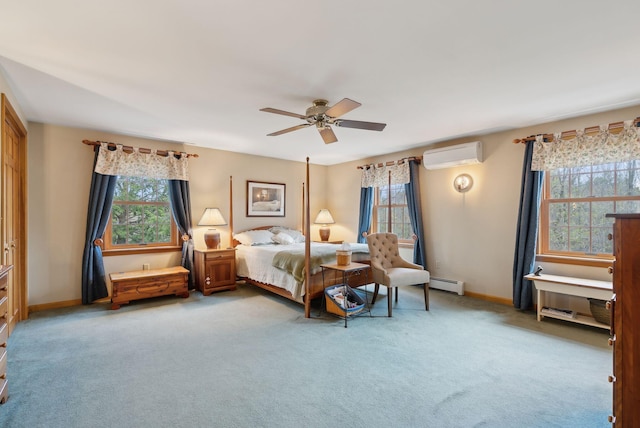 14 Stonebrook Rd, Windham, ME 04062 - bedroom featuring a baseboard radiator, a wall mounted air conditioner, multiple windows, and carpet