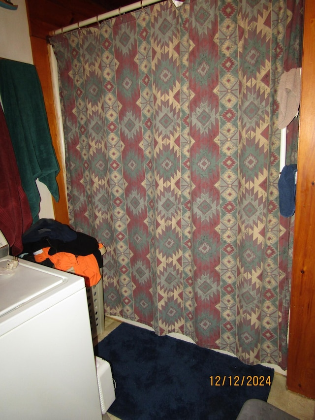 washroom featuring washer / clothes dryer