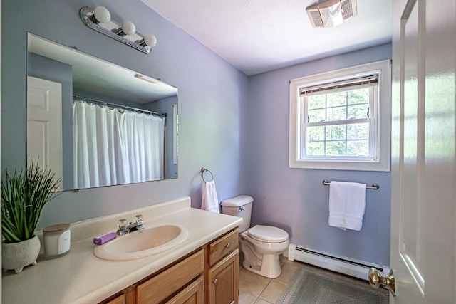 18 Sheila Cir, Saco, ME 04072 - full bath with baseboard heating, vanity, tile patterned floors, toilet, and a shower with shower curtain