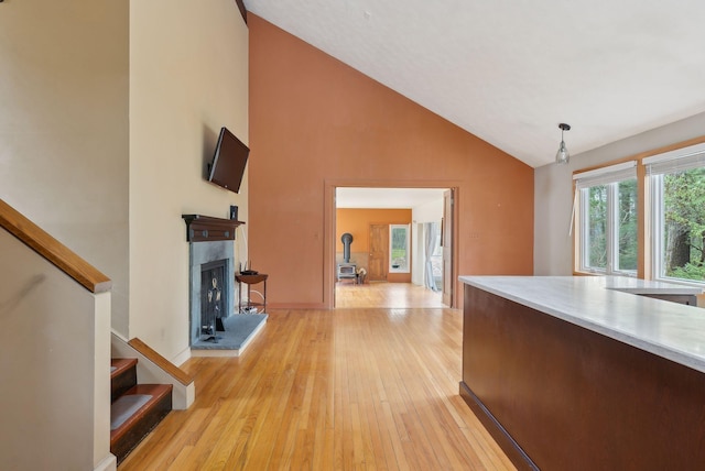 12 Bufflehead Cove Ln, Kennebunk, ME 04043 - kitchen featuring a wealth of natural light, light wood-style floors, light countertops, and high vaulted ceiling