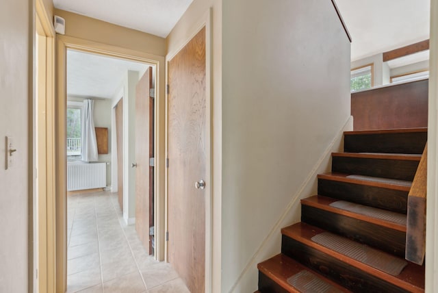 12 Bufflehead Cove Ln, Kennebunk, ME 04043 - staircase featuring tile patterned floors and radiator heating unit